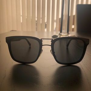 New, stylish, black Prada sunglasses